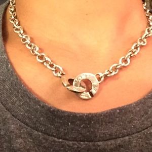 Tiffany necklace with interlock. In box and pouch.